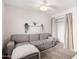 Well-lit bedroom with a pull-out couch and closet at 2524 W Kiva Ave, Mesa, AZ 85202