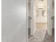 This bathroom entrance features white doors and a view of the double sink vanity at 2754 E Michelle Way, Gilbert, AZ 85234