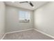 Neutral toned bedroom with a window and ceiling fan at 2754 E Michelle Way, Gilbert, AZ 85234