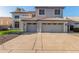 Traditional two-story home with a three-car garage and well-maintained landscaping at 2754 E Michelle Way, Gilbert, AZ 85234