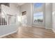 Spacious living room featuring tall ceilings, hardwood floors, and natural light at 2754 E Michelle Way, Gilbert, AZ 85234