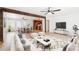 Bright and airy living room with a large rug, modern furniture, and an open floor plan at 3228 W Mercer Ln, Phoenix, AZ 85029