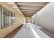 Covered patio with beige siding, concrete flooring, and view of backyard at 3228 W Mercer Ln, Phoenix, AZ 85029