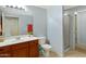 Bathroom with enclosed shower, vanity sink and cabinet storage at 3330 S Gilbert Rd # 1020, Chandler, AZ 85286
