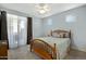 Bright bedroom with a ceiling fan, carpet, and many windows at 3330 S Gilbert Rd # 1020, Chandler, AZ 85286
