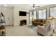 Cozy living room with tile flooring, comfortable seating, ceiling fan, and natural light at 3330 S Gilbert Rd # 1020, Chandler, AZ 85286