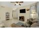 Comfortable living room featuring tile flooring, ceiling fan, and ample seating at 3330 S Gilbert Rd # 1020, Chandler, AZ 85286