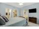 Comfortable main bedroom with neutral paint, carpet, and ensuite bathroom at 3330 S Gilbert Rd # 1020, Chandler, AZ 85286