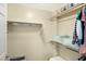 Walk-in closet with shelving and rack storage space at 3330 S Gilbert Rd # 1020, Chandler, AZ 85286