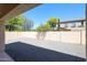 Under the covered patio showing the yard and trees beyond the wall at 3330 W Gran Paradiso Dr, Phoenix, AZ 85086