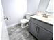 Bathroom featuring a gray vanity with ample cabinet space at 3330 W Gran Paradiso Dr, Phoenix, AZ 85086