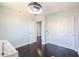 Bedroom view shows sliding closet doors, hardwood floors, and modern ceiling fan at 3330 W Gran Paradiso Dr, Phoenix, AZ 85086