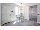 Breakfast nook with table and chairs under a modern light fixture at 3330 W Gran Paradiso Dr, Phoenix, AZ 85086