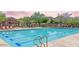 Enjoy the community pool with lap lanes, lounge chairs, and scenic mountain views at 3330 W Gran Paradiso Dr, Phoenix, AZ 85086