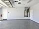 Well-lit garage with epoxy flooring, a water heater, and ample storage space at 3330 W Gran Paradiso Dr, Phoenix, AZ 85086