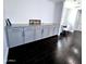 Home office with custom built-in desk and cabinetry for ample storage and organization at 3330 W Gran Paradiso Dr, Phoenix, AZ 85086