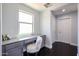 Bright home office with built-in desk and storage featuring sleek finishes and natural light at 3330 W Gran Paradiso Dr, Phoenix, AZ 85086