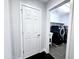 Easy access to laundry room from doorway showing modern washer and dryer and utlity sink at 3330 W Gran Paradiso Dr, Phoenix, AZ 85086