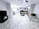 Open floor plan combining the kitchen, dining area, and living room for seamless entertaining and Gathering time at 3330 W Gran Paradiso Dr, Phoenix, AZ 85086