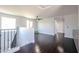 Upstairs living room with ceiling fan and hardwood floors, perfect for entertaining at 3330 W Gran Paradiso Dr, Phoenix, AZ 85086