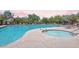 An in-ground pool and jacuzzi offers a great place for residents of this home to relax and have fun at 3330 W Gran Paradiso Dr, Phoenix, AZ 85086