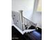 Modern staircase with wood treads and decorative metal railing under natural light at 3330 W Gran Paradiso Dr, Phoenix, AZ 85086