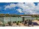 Tennis courts feature desert landscaping and covered seating area and mountain views at 3330 W Gran Paradiso Dr, Phoenix, AZ 85086