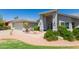 Charming home exterior with a well-manicured lawn and inviting front entrance at 3544 E Fox St, Mesa, AZ 85213