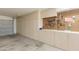 Garage features ample storage space with built-in cabinets and pegboard for tools at 3544 E Fox St, Mesa, AZ 85213