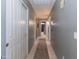 Neutral hallway with tile floors and access to other rooms in the home at 3544 E Fox St, Mesa, AZ 85213