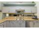 Kitchen with stainless steel appliances, granite countertops, undermount sink, and lots of storage at 3544 E Fox St, Mesa, AZ 85213