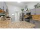 Updated kitchen with granite countertops, stainless steel appliances, and ample cabinet space for storage at 3544 E Fox St, Mesa, AZ 85213