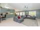 Comfortable living room with tile floors and an inviting sectional sofa at 3544 E Fox St, Mesa, AZ 85213