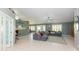 Expansive living room offers views of the kitchen and backyard, perfect for modern living at 3544 E Fox St, Mesa, AZ 85213