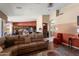 Open-concept living room with connecting kitchen and dining area, creating a spacious feel at 3797 N 156Th N Dr, Goodyear, AZ 85395