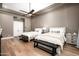 Spacious bedroom with two beds, hardwood flooring, and a contemporary design at 39847 N 105Th Pl, Scottsdale, AZ 85262