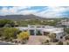 Beautiful home with desert landscaping, a circular driveway, and impressive mountain views at 39847 N 105Th Pl, Scottsdale, AZ 85262