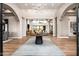 Impressive foyer with wood floors, neutral walls, grand staircase and chandelier at 39847 N 105Th Pl, Scottsdale, AZ 85262