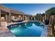 An inviting pool and spa area with desert landscaping, perfect for outdoor entertaining and relaxation at 39847 N 105Th Pl, Scottsdale, AZ 85262