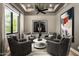 Contemporary sitting room featuring neutral tones, stylish decor, and comfortable seating arrangement at 39847 N 105Th Pl, Scottsdale, AZ 85262