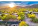 Beautiful desert home boasts desert landscaping, mature trees and easy access to golf and walking paths at 41590 N 108Th St, Scottsdale, AZ 85262