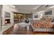 Inviting bedroom with fireplace, and sliding glass door offering scenic views at 41590 N 108Th St, Scottsdale, AZ 85262