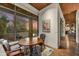 Charming breakfast nook with picturesque views and copper breakfast table at 41590 N 108Th St, Scottsdale, AZ 85262