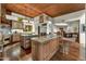 Gourmet kitchen featuring custom cabinets, granite countertops, and stainless steel appliances at 41590 N 108Th St, Scottsdale, AZ 85262