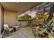Outdoor patio area with comfortable seating and desert landscaping, perfect for relaxation at 41590 N 108Th St, Scottsdale, AZ 85262
