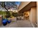 Relaxing outdoor patio with desert landscaping, seating area, and mountain views in the background at 41590 N 108Th St, Scottsdale, AZ 85262