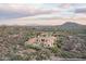 Luxury desert home boasting panoramic views of mountains and desert landscape, with a beautifully tiled roof at 42155 N 97Th Way, Scottsdale, AZ 85262