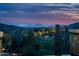 Scenic night view showcasing city lights and desert landscape at 42155 N 97Th Way, Scottsdale, AZ 85262