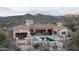 Beautiful rear exterior of home with pool, patio and mountain views at 42155 N 97Th Way, Scottsdale, AZ 85262