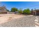 Gravel backyard showing shed and shade trees at 4303 N 18Th St, Phoenix, AZ 85016